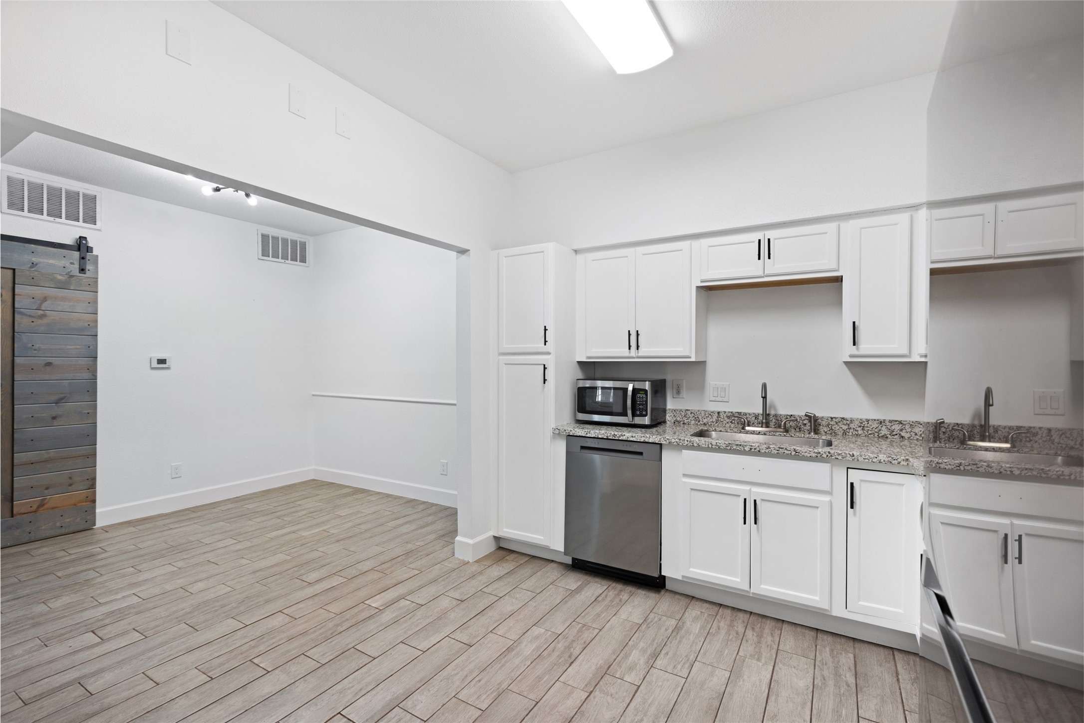 2100 Tanglewilde Street, Unit 378 Houston, TX 77063 - Photo 13 of 25 Whip up a 5-star meal… or just stare at your DoorDash delivery here.