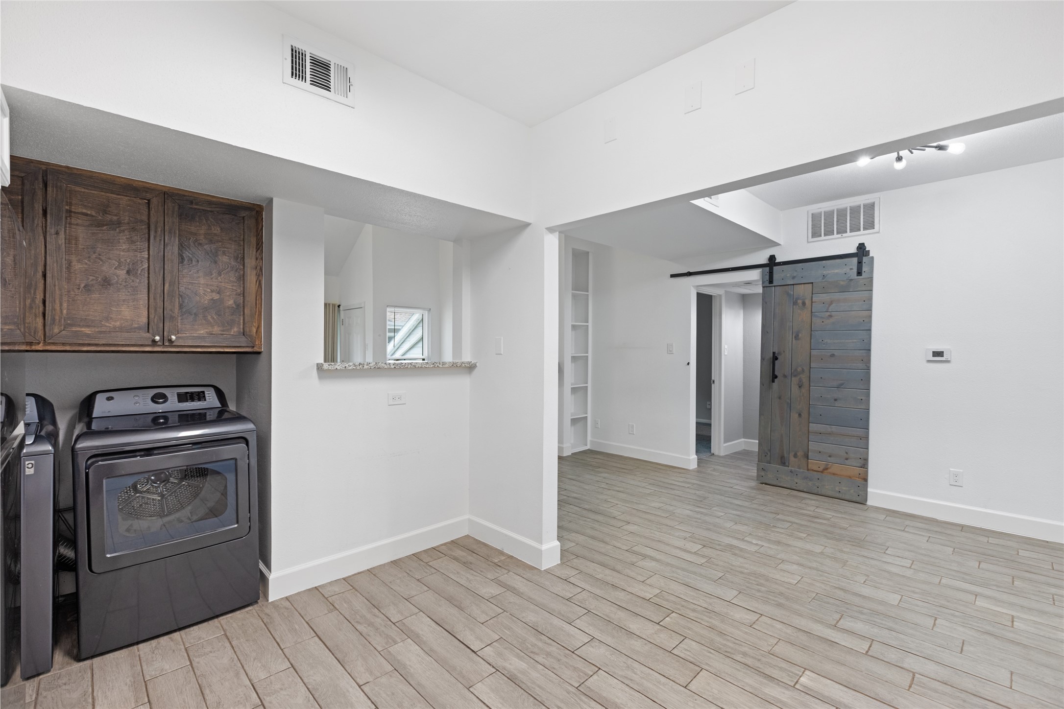 2100 Tanglewilde Street, Unit 378 Houston, TX 77063 - Photo 14 of 25 Washer and dryer INCLUDED—because adulting is hard enough without coin slots.