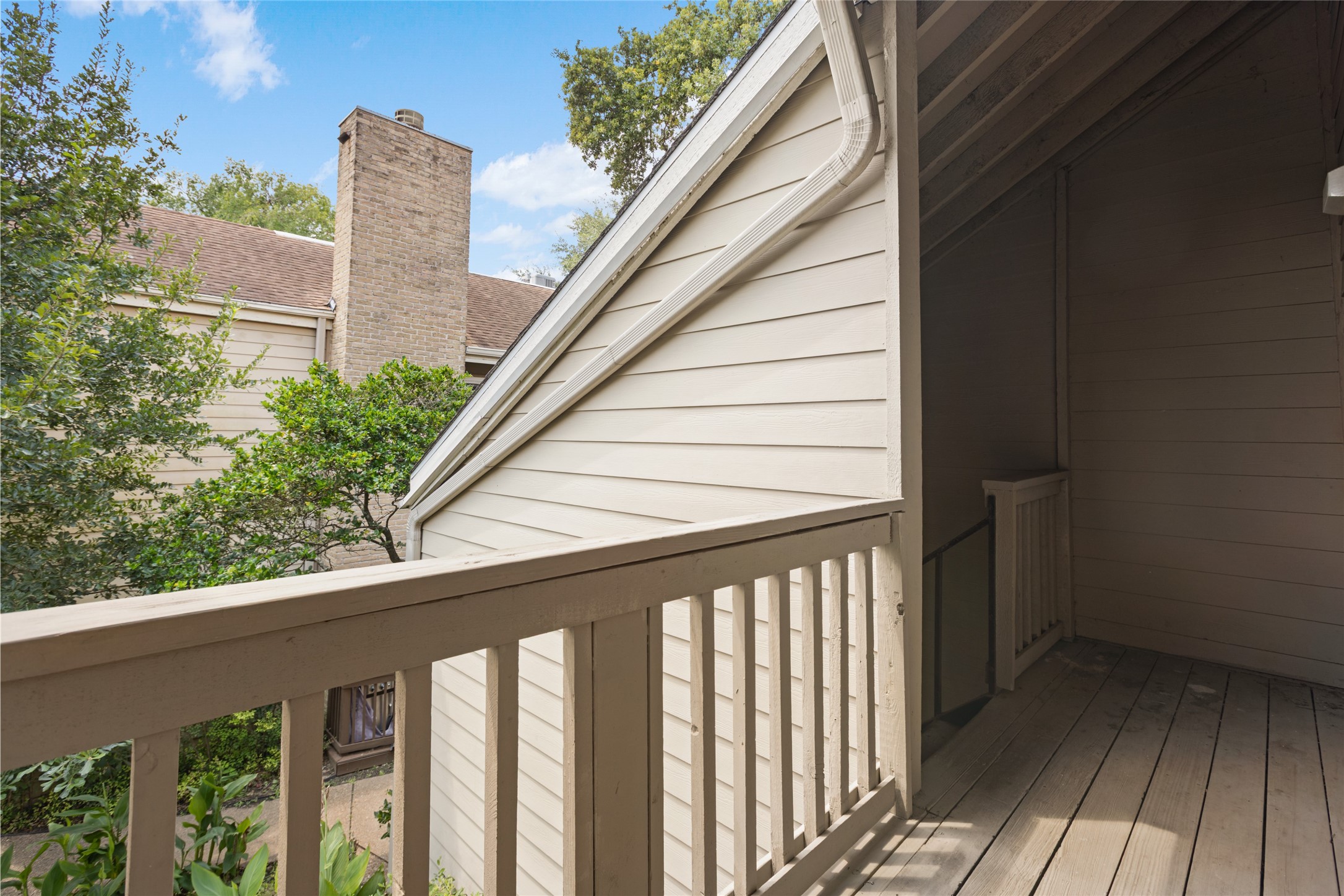 2100 Tanglewilde Street, Unit 378 Houston, TX 77063 - Photo 2 of 25 Morning coffee, evening wine, or just eavesdropping on the neighbors—this balcony is ready.