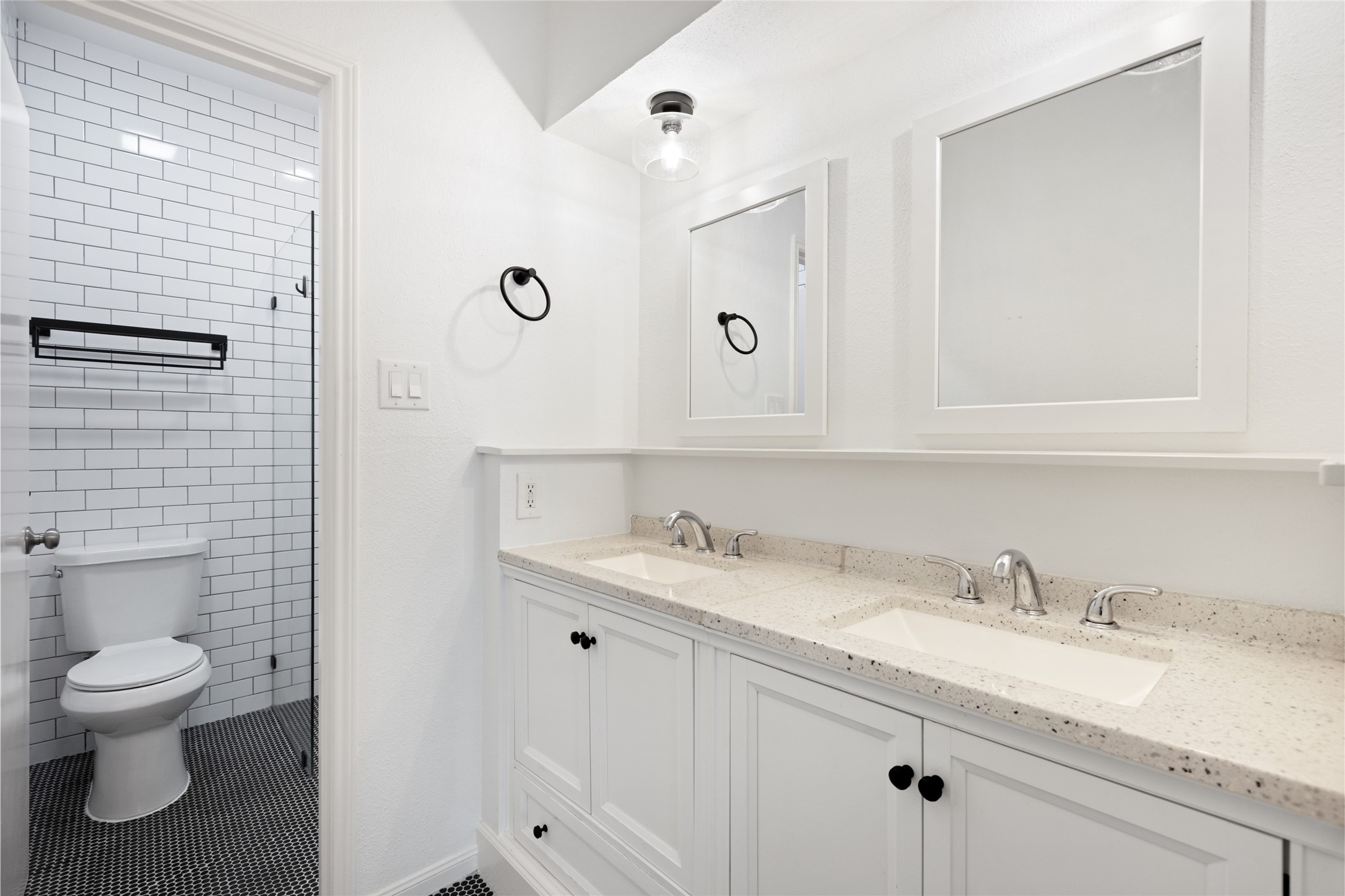 2100 Tanglewilde Street, Unit 378 Houston, TX 77063 - Photo 23 of 25 No more fighting over sink space—this vanity has two! Perfect for … or just you and your 87 skincare products.