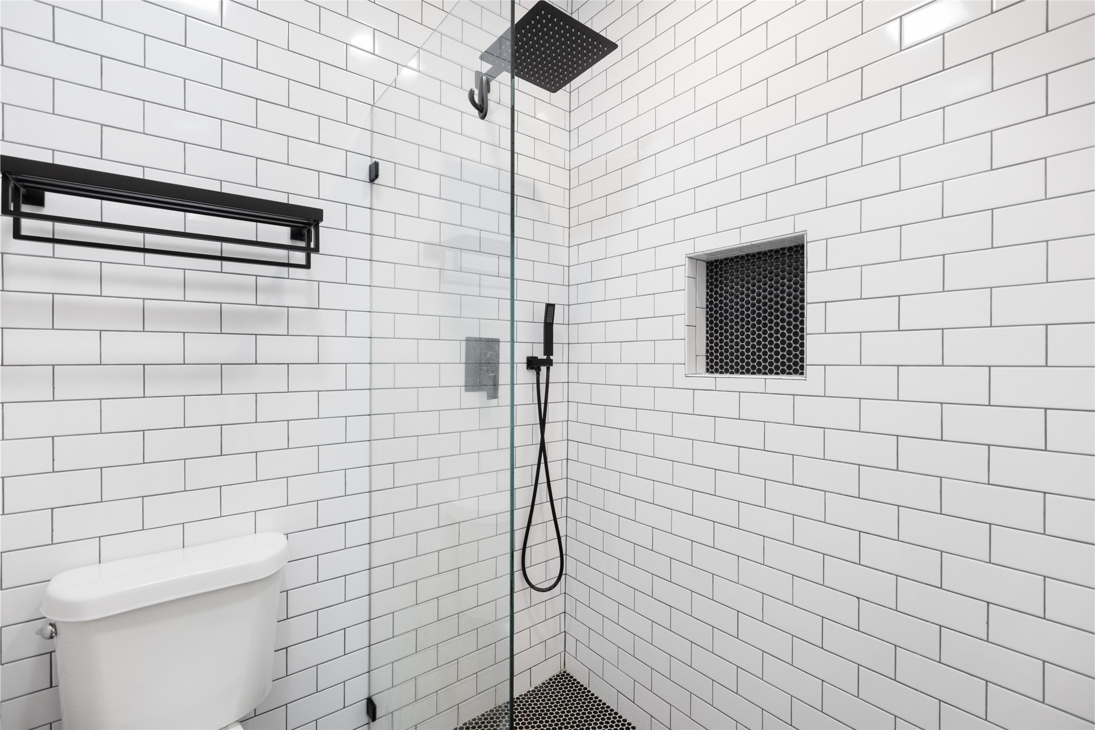 2100 Tanglewilde Street, Unit 378 Houston, TX 77063 - Photo 24 of 25 This shower is basically a spa day every day. All it’s missing is your loofah and bad singing voice.