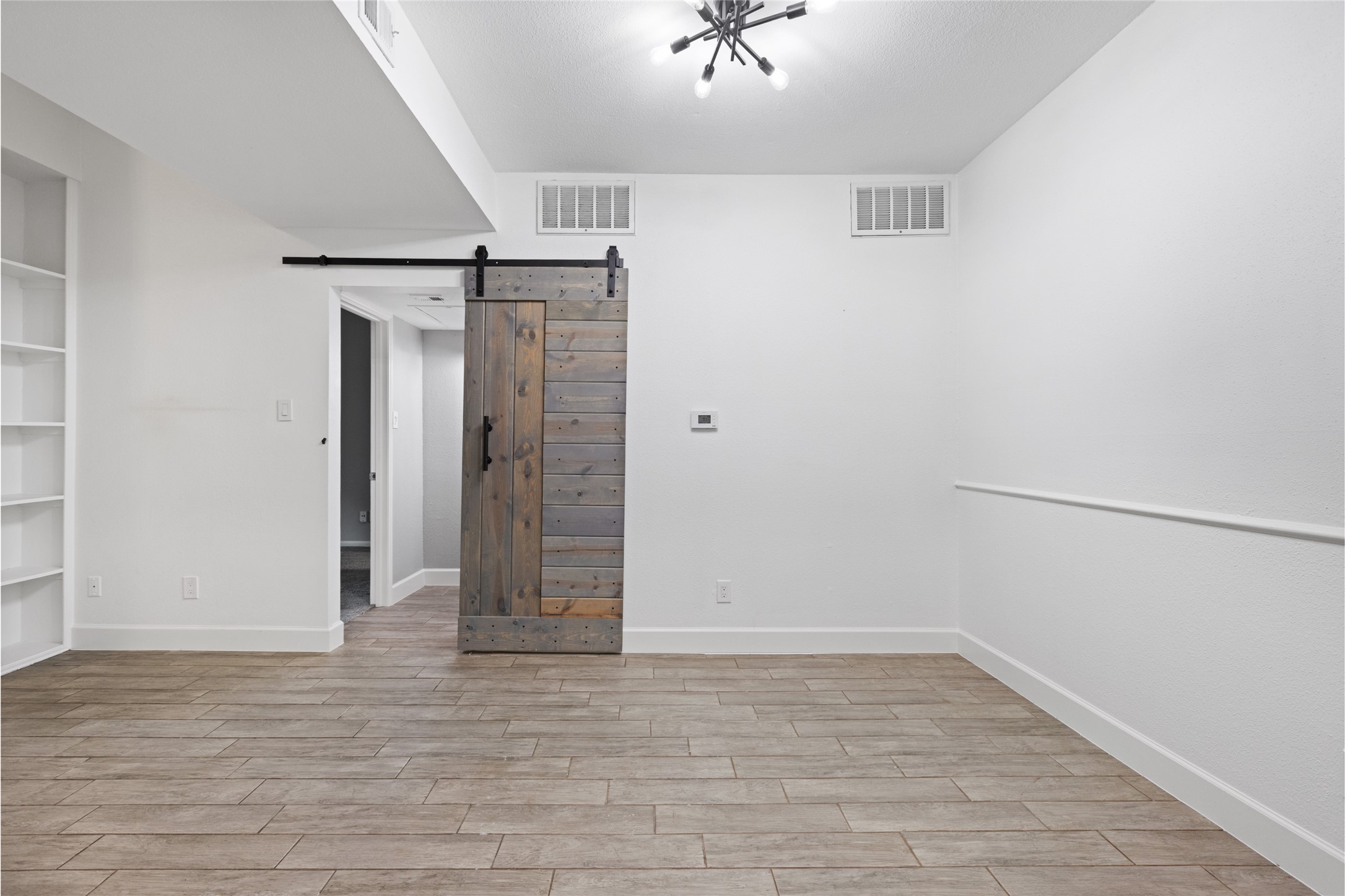 2100 Tanglewilde Street, Unit 378 Houston, TX 77063 - Photo 7 of 25 Because every home needs that one feature that makes guests say, “Ohhh, fancy!” before they immediately try sliding it back and forth 12 times.