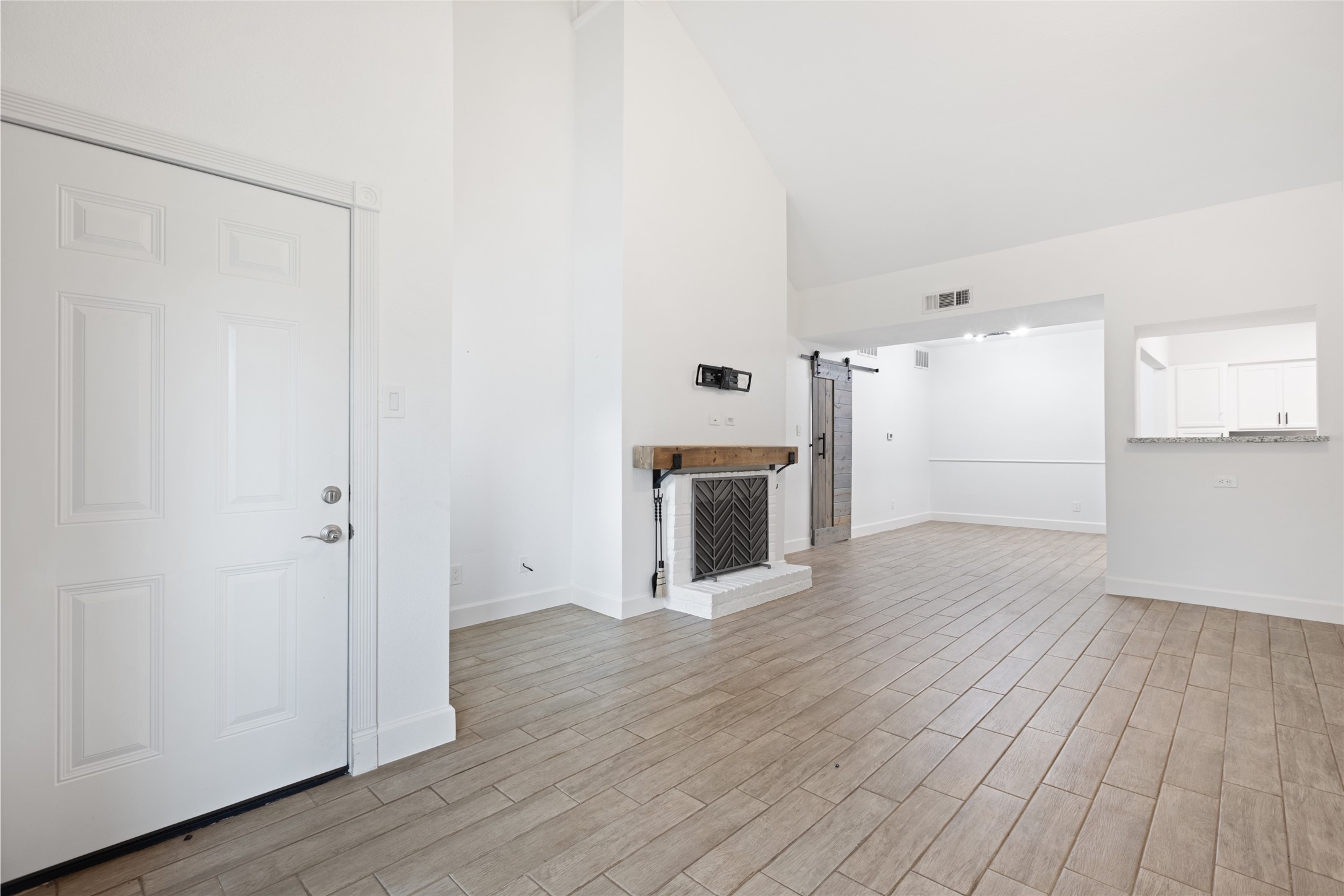 2100 Tanglewilde Street, Unit 378 Houston, TX 77063 - Photo 8 of 25 Tall ceilings, a fireplace, and space for your giant TV. Basically HGTV called and said you’ve arrived