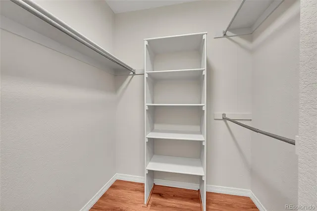 a view of an empty walk in closet
