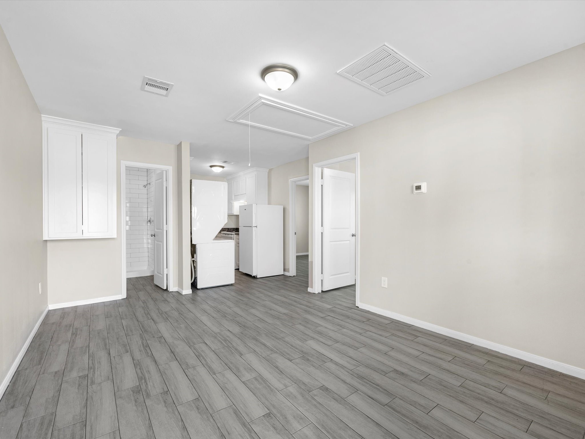 2202 Solo Street, Unit 2204 Houston, TX 77020 - Photo 5 of 21 a view of empty room with wooden floor