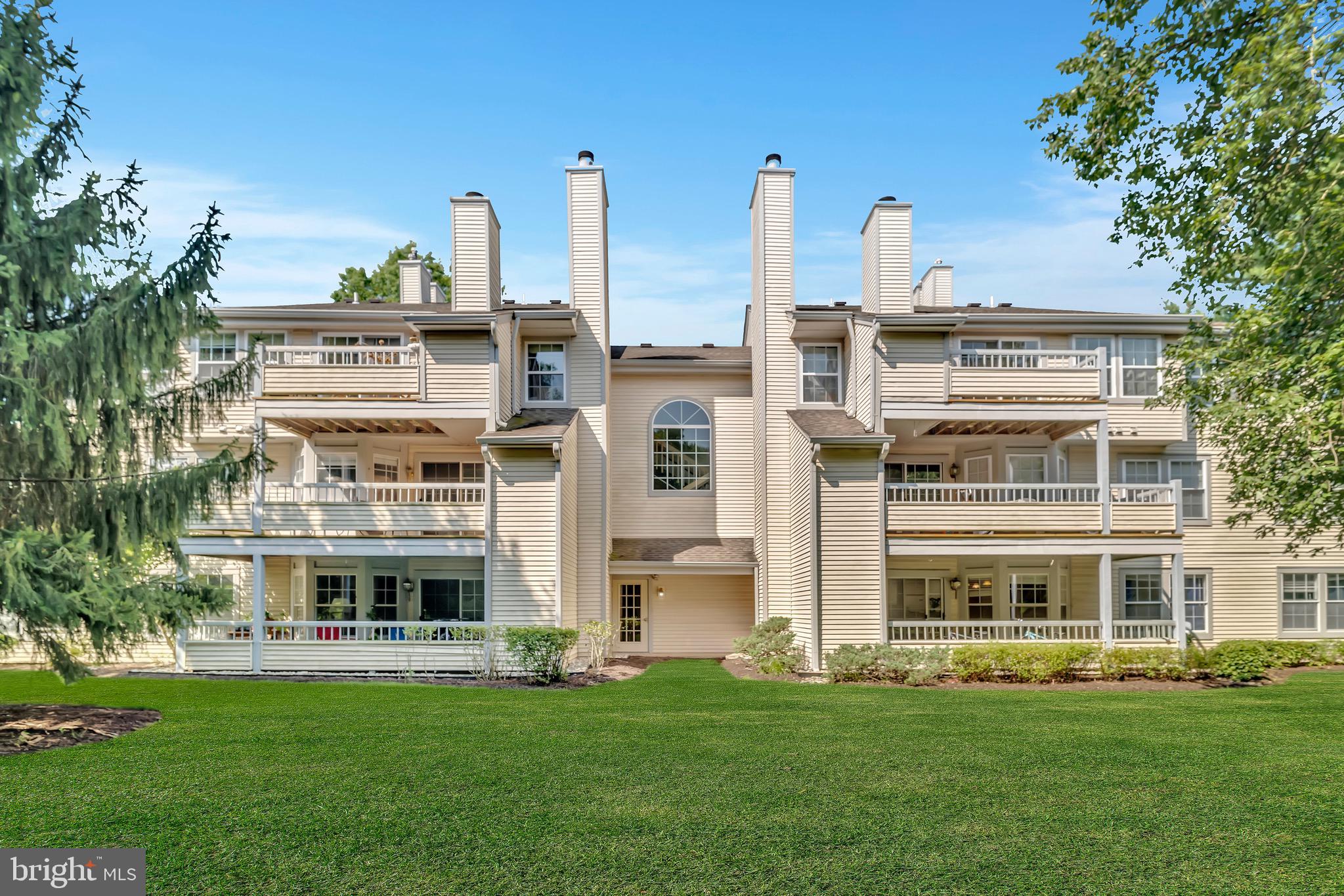302 Trinity Court, Unit 8 Princeton, NJ 08540 - Photo 17 of 17 a view of building with yard in front of it