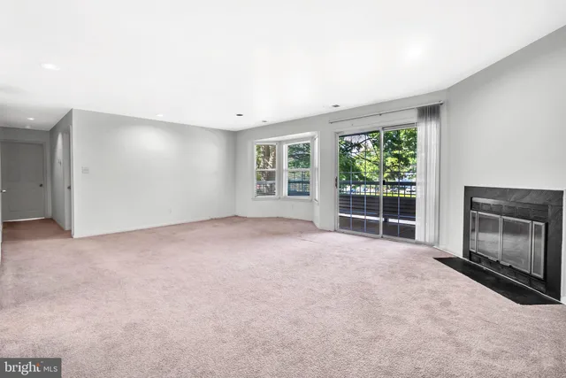 a view of empty room with front door