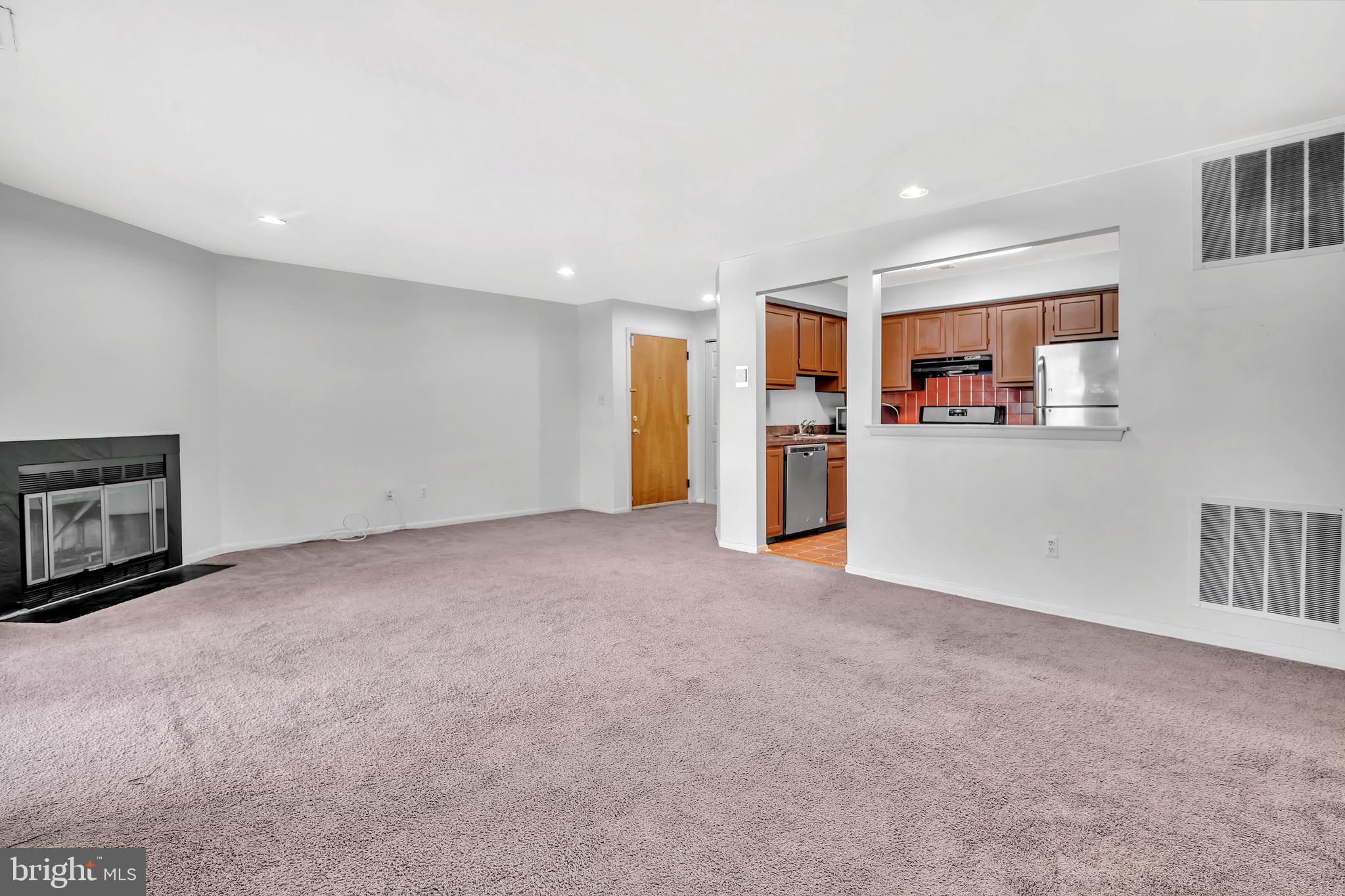 302 Trinity Court, Unit 8 Princeton, NJ 08540 - Photo 7 of 17 a view of a kitchen with furniture and a kitchen