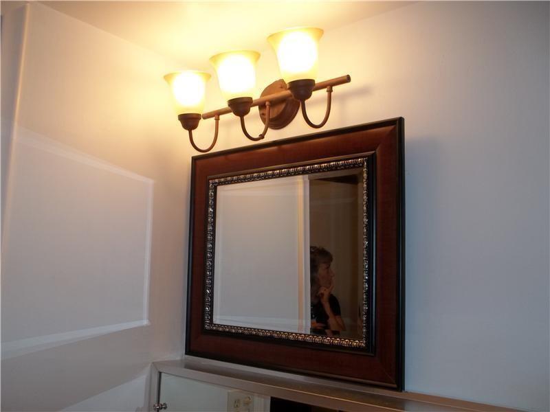 2901 Fiore Way, Unit 107 Delray Beach, FL 33445 - Photo 7 of 13 a view of a door with a wooden door