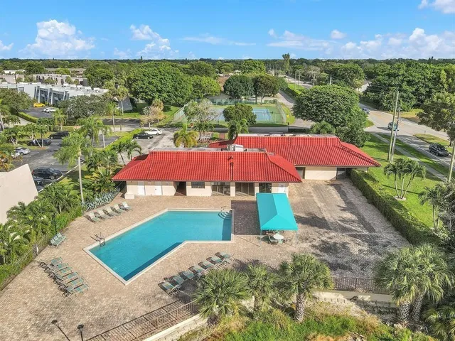 a view of a balcony with an outdoor space and garden