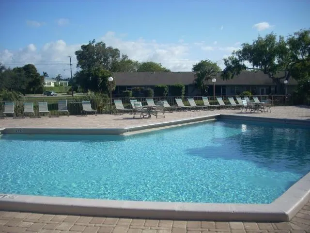 a front view of house with yard and seating area