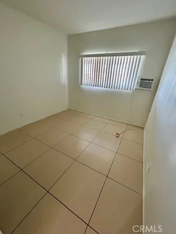 a view of a hallway with a window