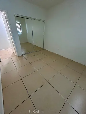 an empty room with mirror