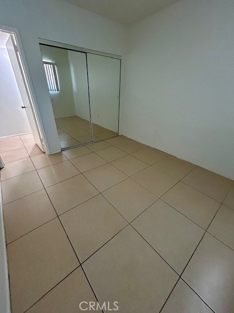 37111 Cathedral Canyon Drive, Unit 1 Cathedral City, CA 92234 - Photo 15 of 19 an empty room with mirror