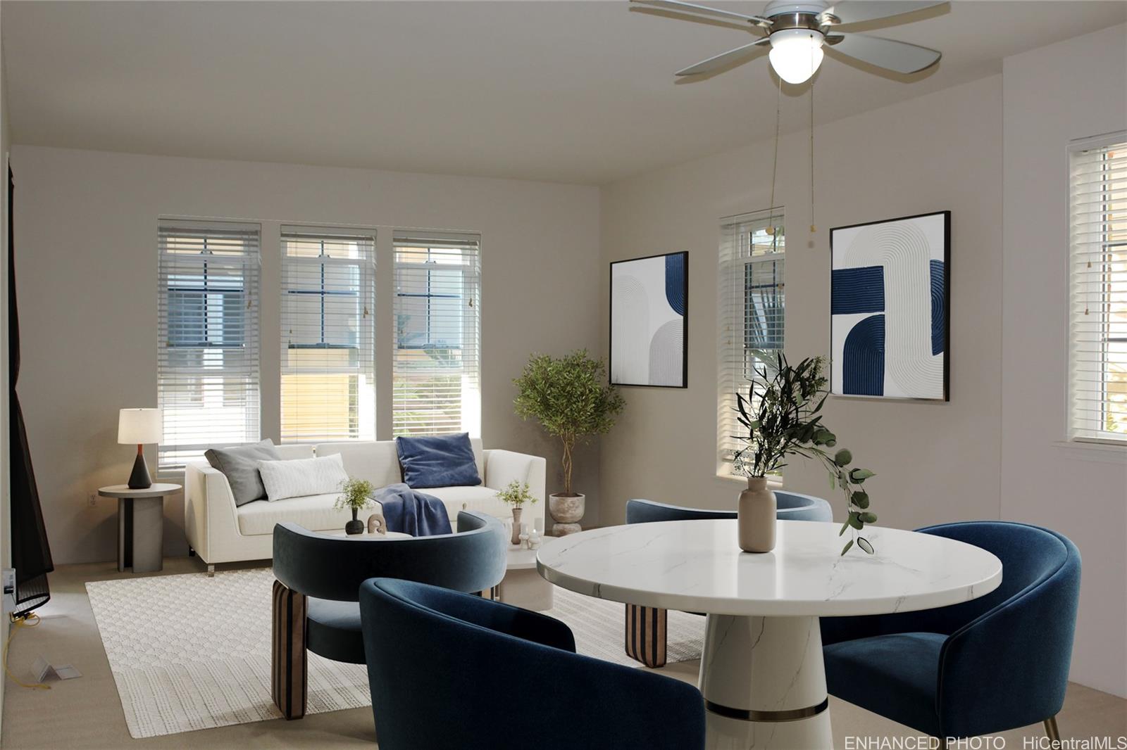 a view of a dining room with furniture and a large window