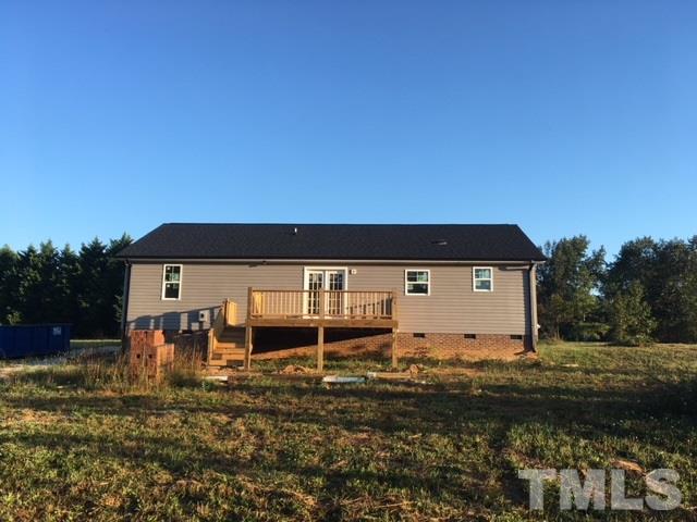 5017 West Pool Road Rougemont, NC 27572 - Photo 3 of 4 a view of a house with a yard