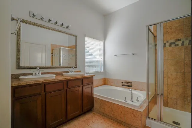 a view of a house with a tree