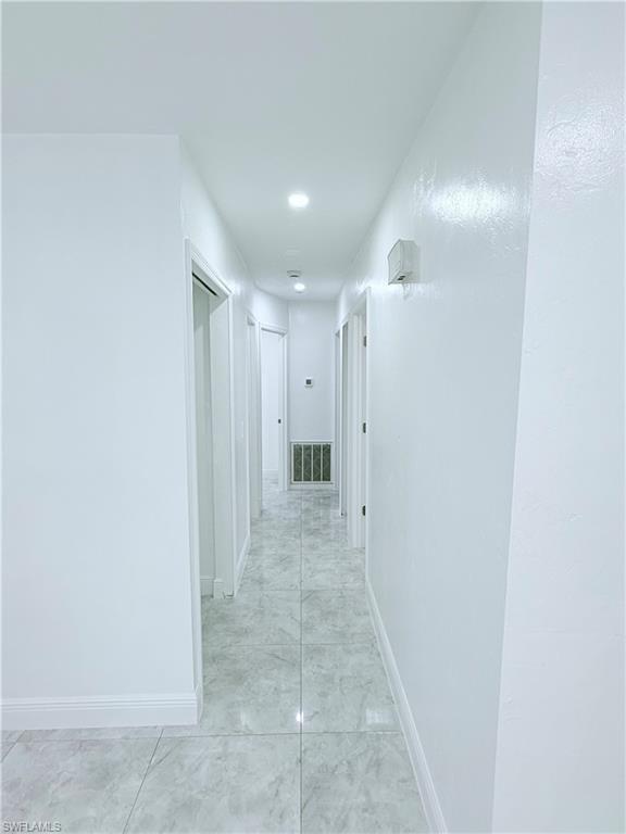 3330 13th Avenue Southwest Naples, FL 34117 - Photo 33 of 50 a view of a hallway