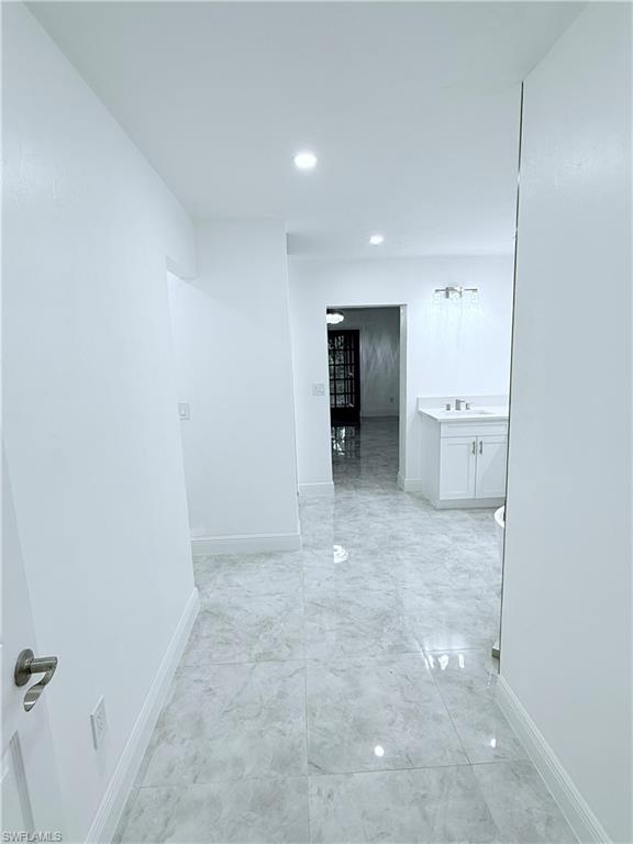 3330 13th Avenue Southwest Naples, FL 34117 - Photo 43 of 50 an empty room with a bathroom