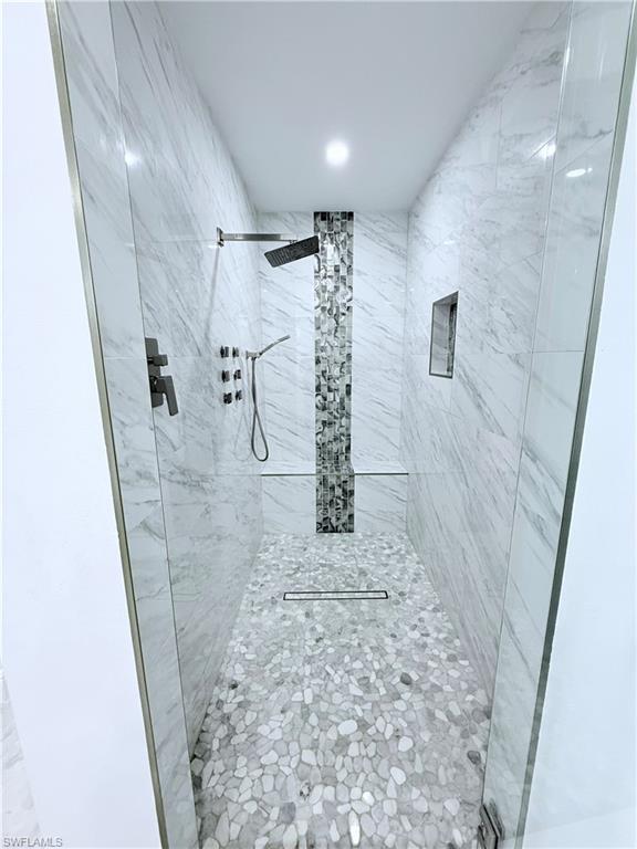 3330 13th Avenue Southwest Naples, FL 34117 - Photo 45 of 50 a bathroom with a shower