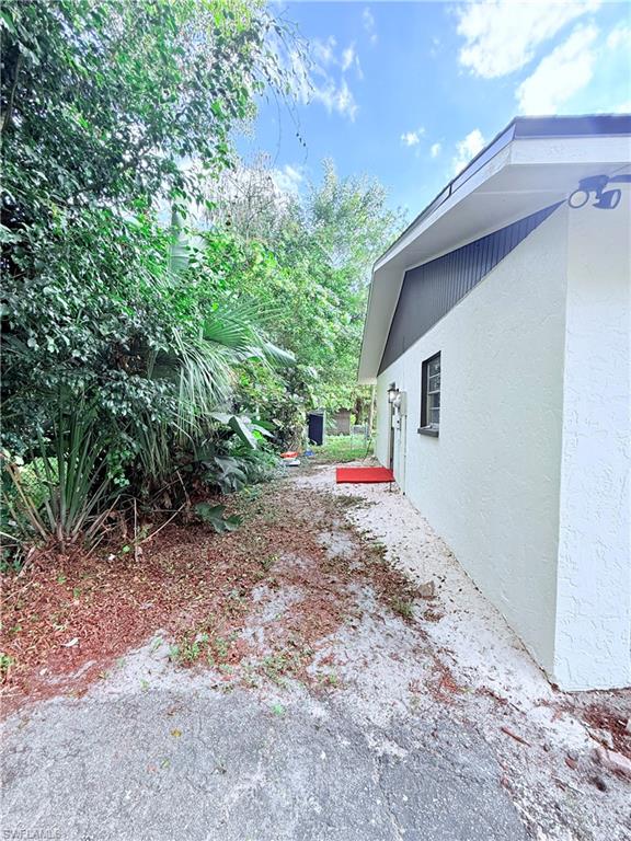 3330 13th Avenue Southwest Naples, FL 34117 - Photo 6 of 50 a view of open space in front of a house