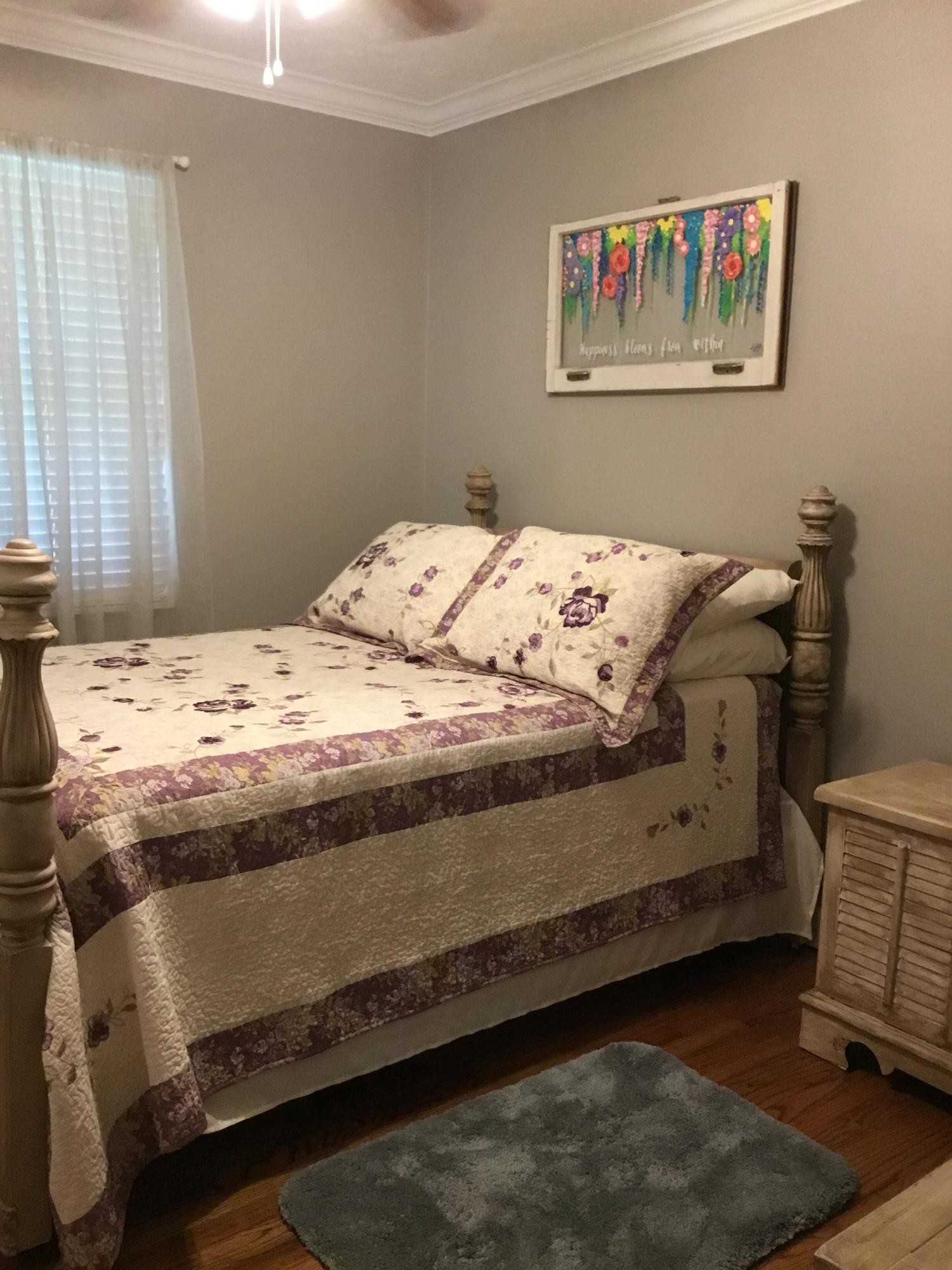121 East Arrowwood Road Oak Ridge, TN 37830 - Photo 16 of 26 a bed sitting in a bedroom next to a window