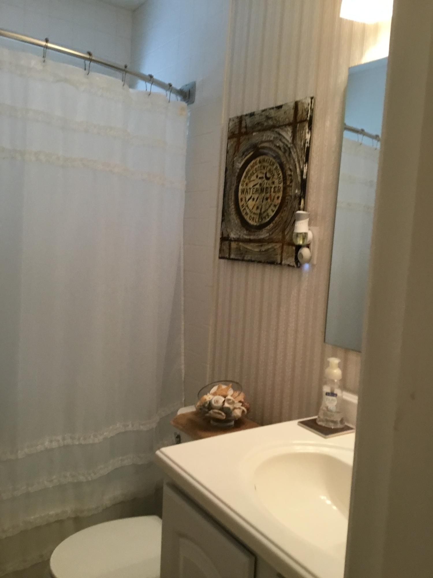 121 East Arrowwood Road Oak Ridge, TN 37830 - Photo 24 of 26 a bathroom with a sink and a toilet