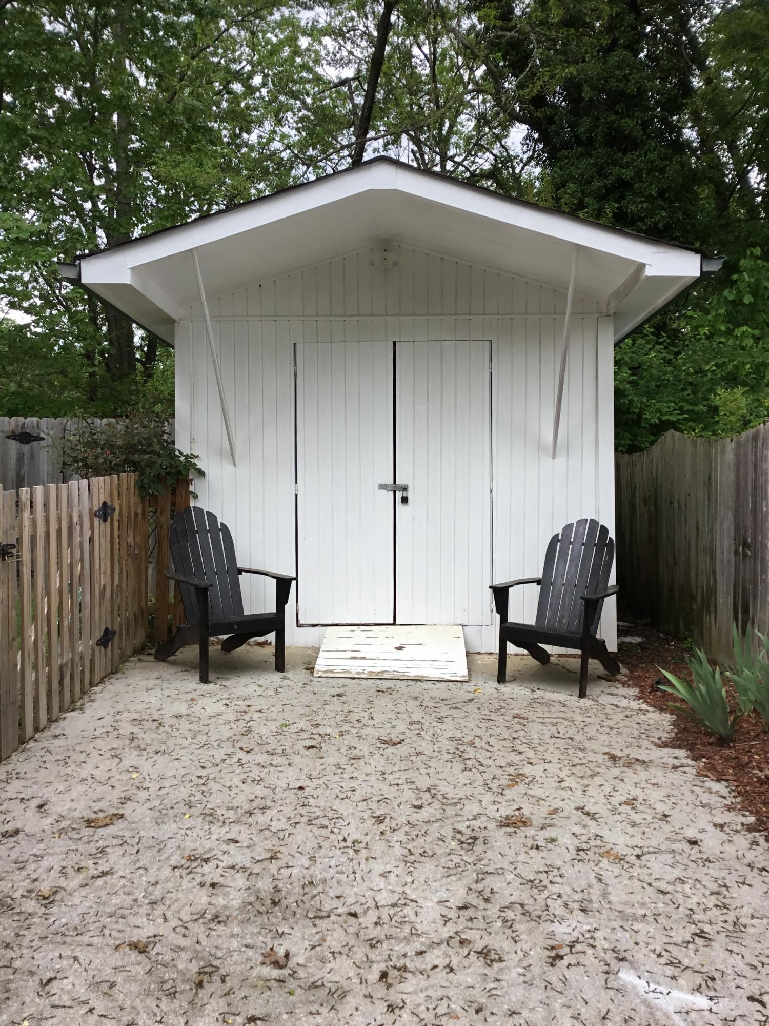 121 East Arrowwood Road Oak Ridge, TN 37830 - Photo 26 of 26 a backyard of a house with table and chairs