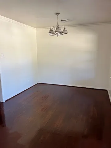 a view of a room with an empty space
