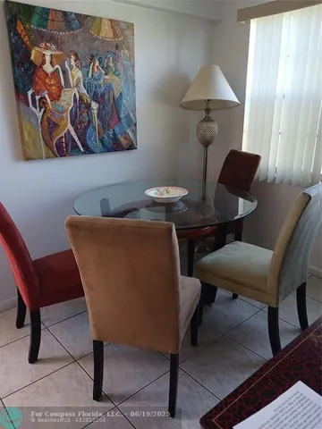 a view of a workspace with furniture