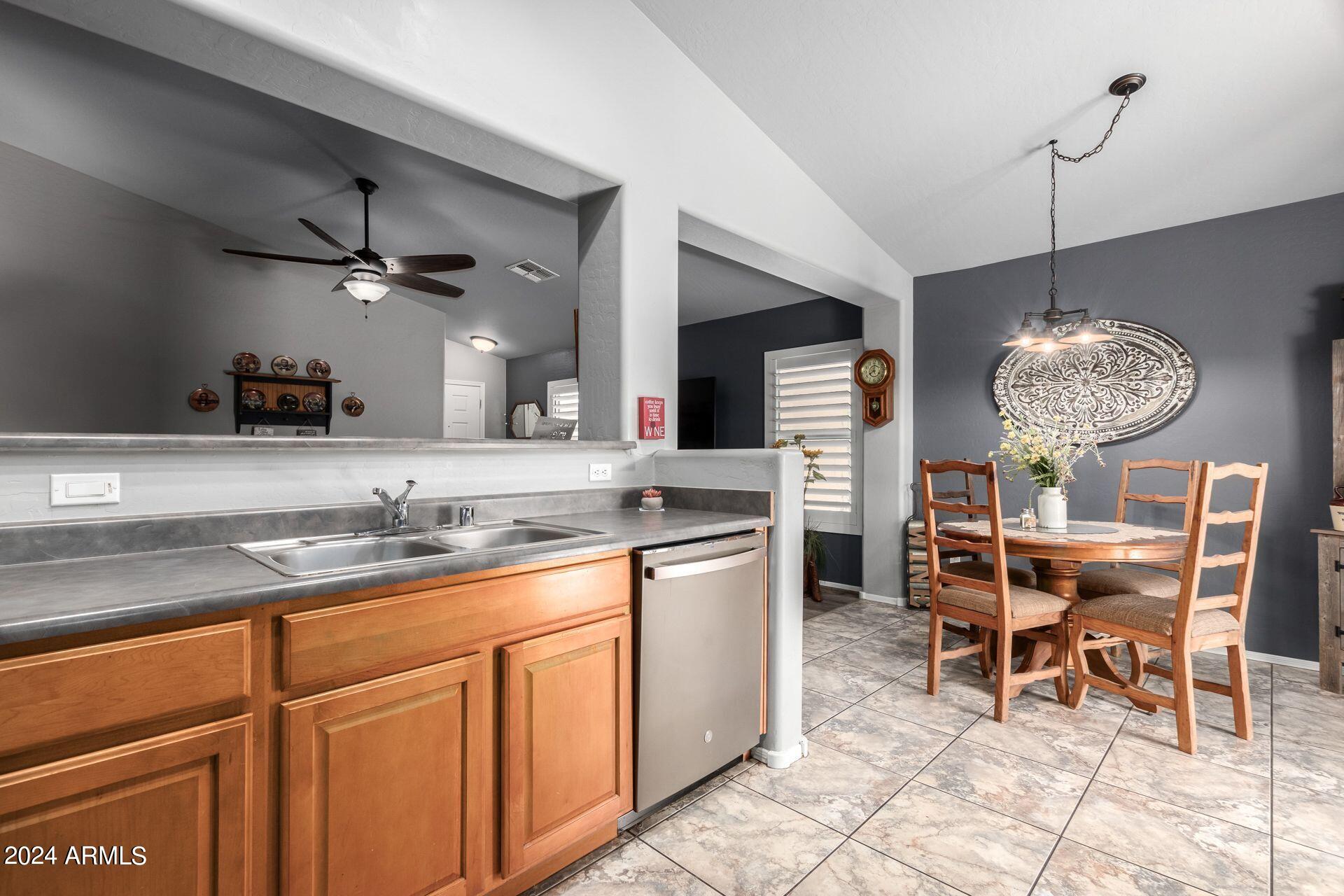 4173 East Sierrita Road San Tan Valley, AZ 85143 - Photo 13 of 26 Kitchen Pass-Through to Living Room