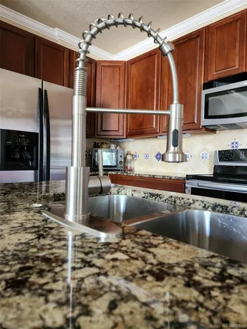 a bedroom with a bed and a fireplace