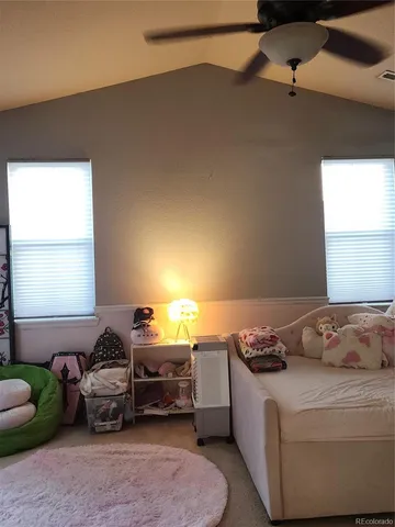 a view of en suite bathroom with sink and mirror