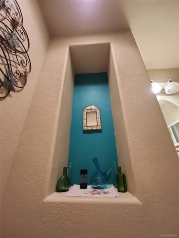 a bed room with a bed and a television