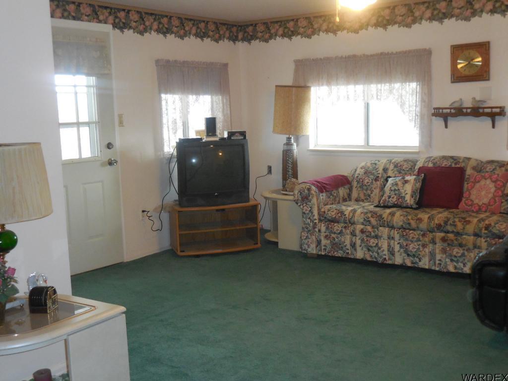 708 Ocotillo Lane Quartzsite, AZ 85346 - Photo 11 of 17 a living room with furniture and a flat screen tv