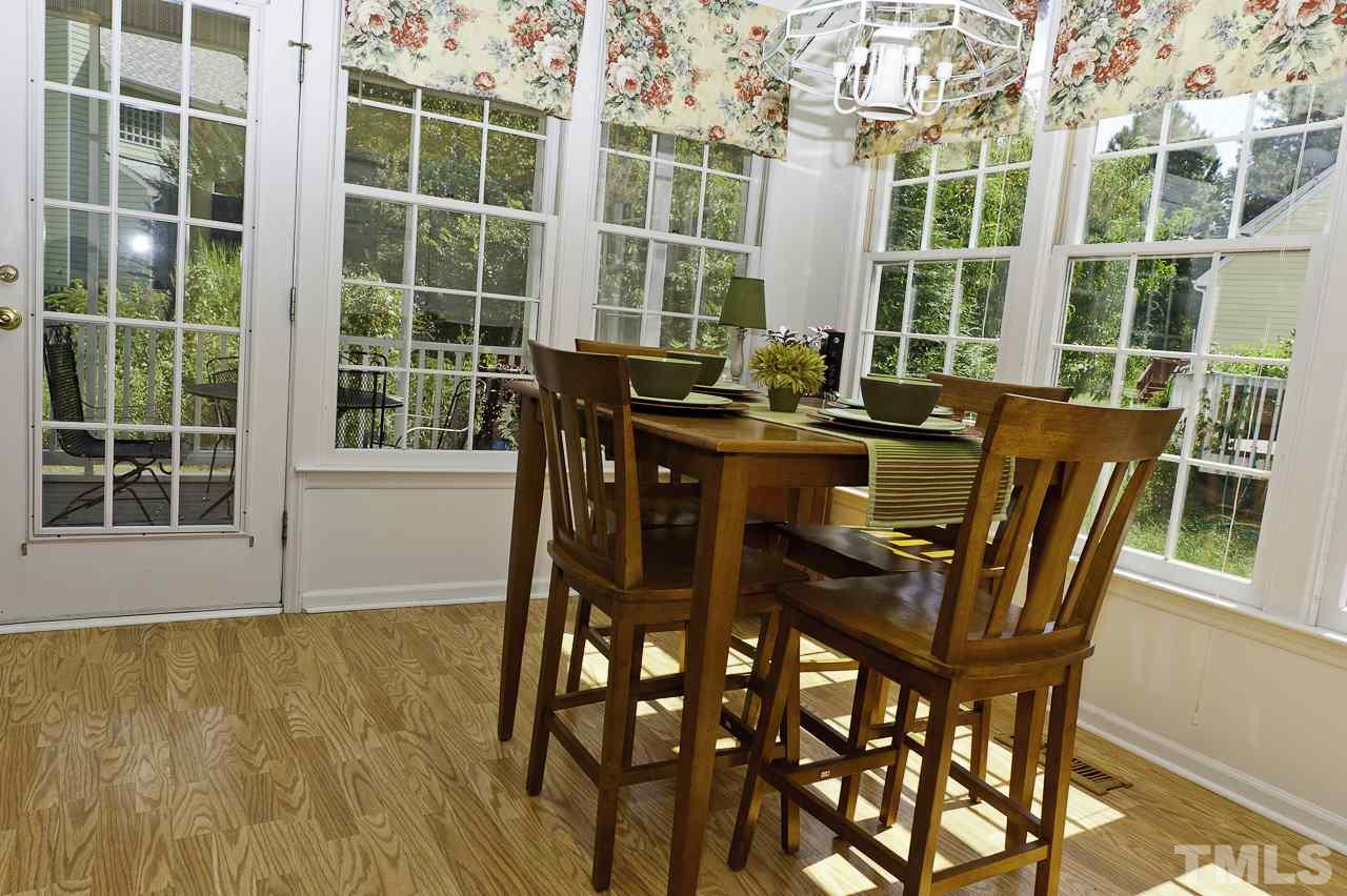 4517 Birmingham Way Raleigh, NC 27604 - Photo 11 of 25 a view of a dining room with furniture window and outside view