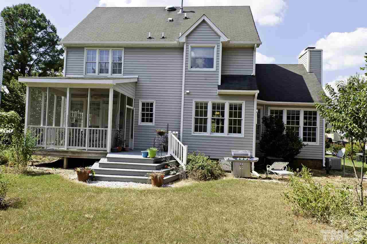 4517 Birmingham Way Raleigh, NC 27604 - Photo 23 of 25 a front view of a house with a yard