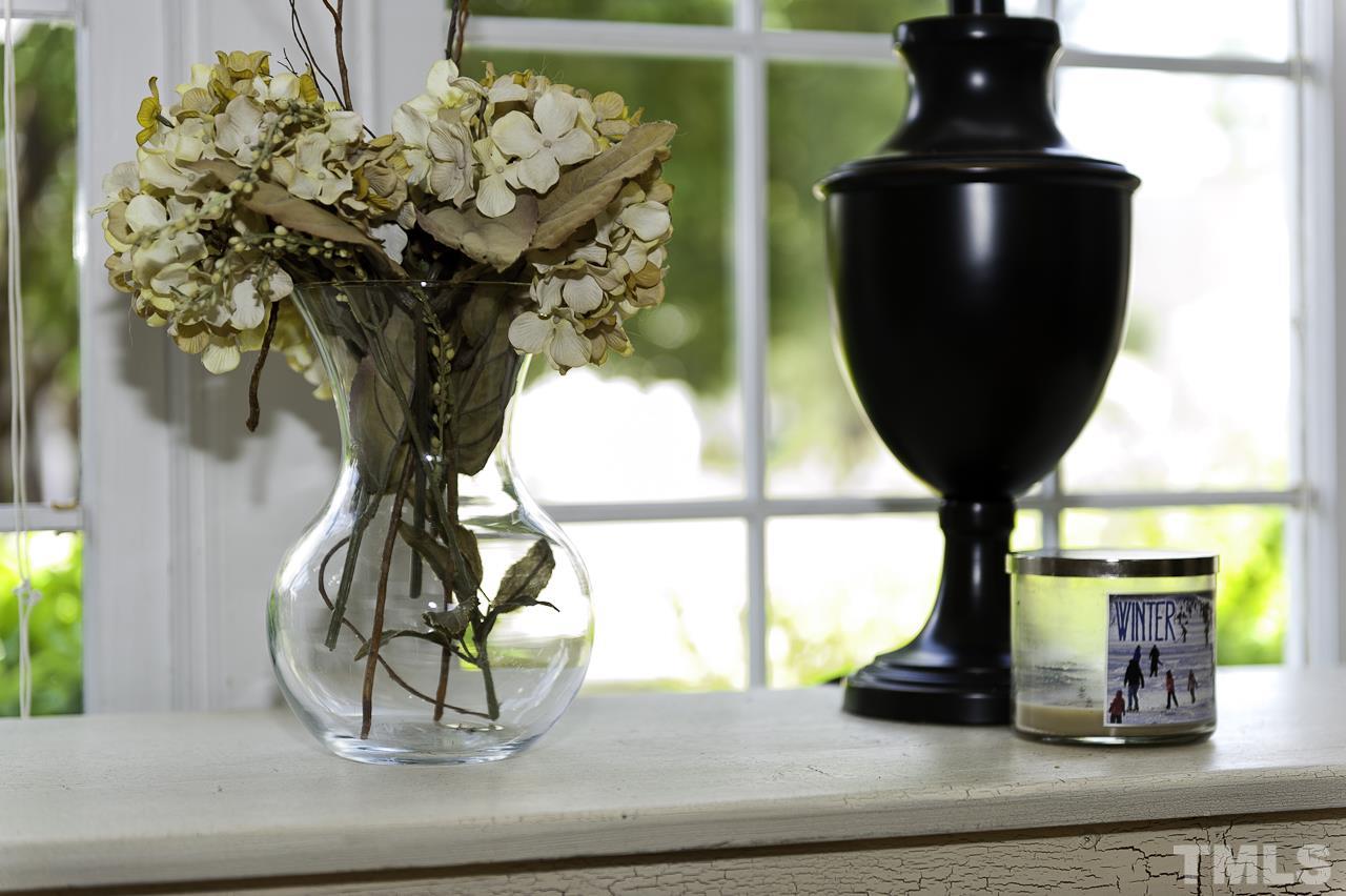 4517 Birmingham Way Raleigh, NC 27604 - Photo 6 of 25 a vase of flowers sitting on a table