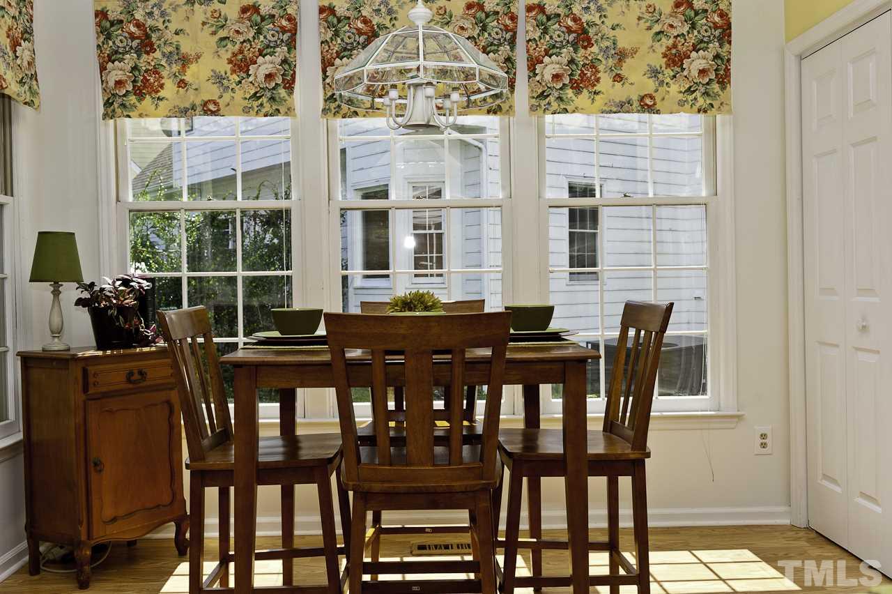 4517 Birmingham Way Raleigh, NC 27604 - Photo 10 of 25 a view of a dining room with furniture and window