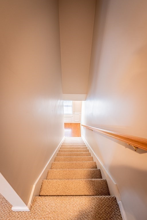 1084 Pine Street, Unit 2 Fall River, MA 02723 - Photo 12 of 22 a view of empty room with wooden floor