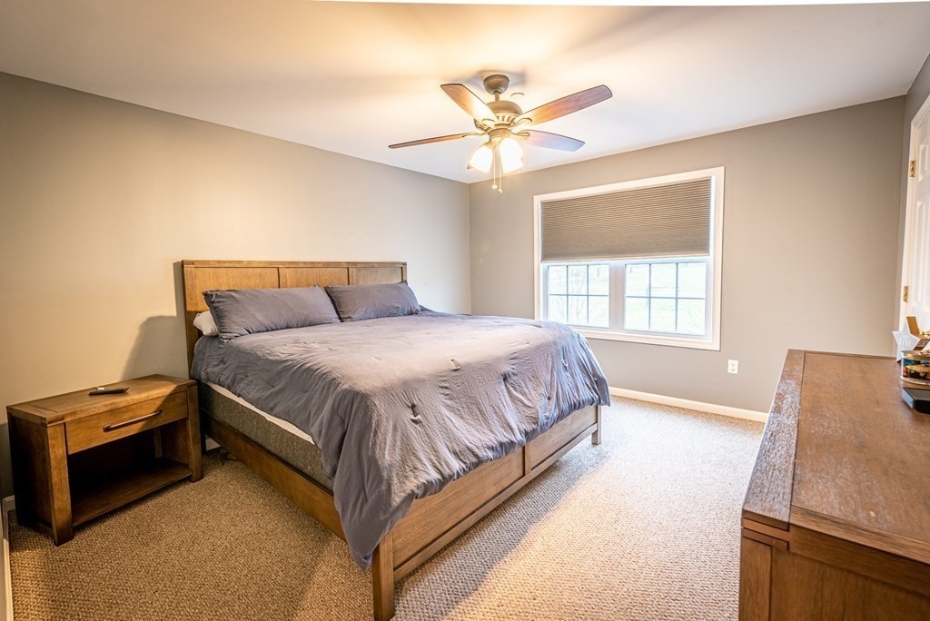 1084 Pine Street, Unit 2 Fall River, MA 02723 - Photo 20 of 22 a spacious bedroom with a bed and window
