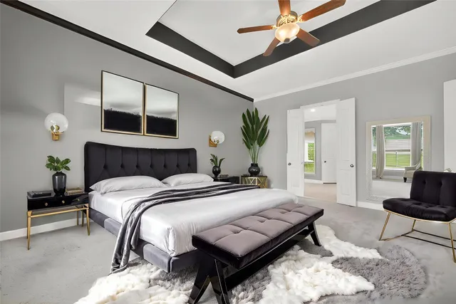 a bedroom with a bed window and couch