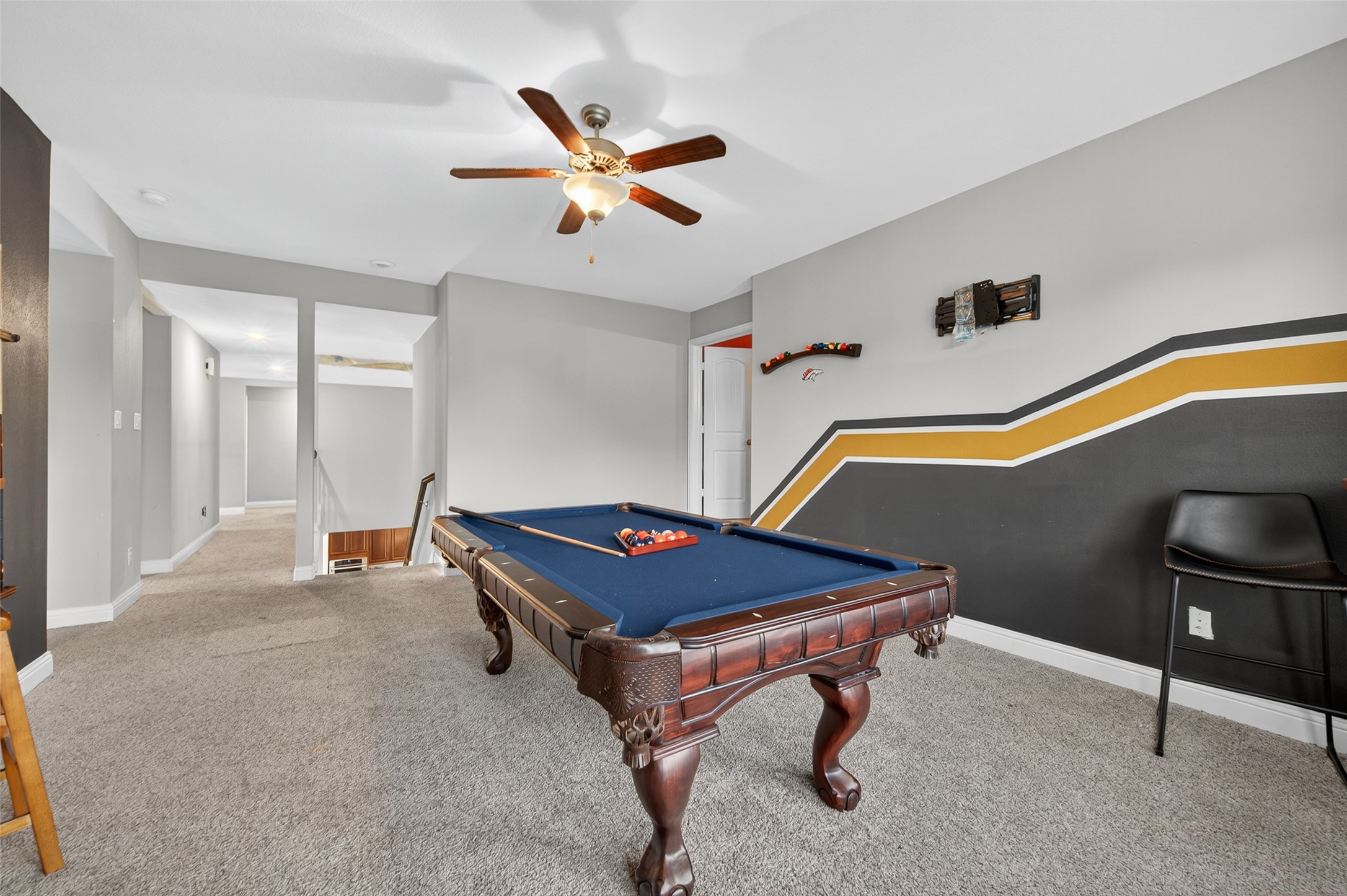 4719 Prairie Springs Lane Rosharon, TX 77583 - Photo 22 of 33 a room with wooden floor and furniture