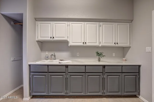 a room with gym equipment and a mirror