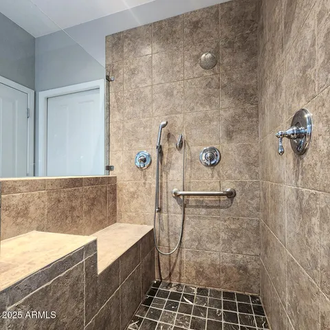 a white toilet sitting in a bathroom