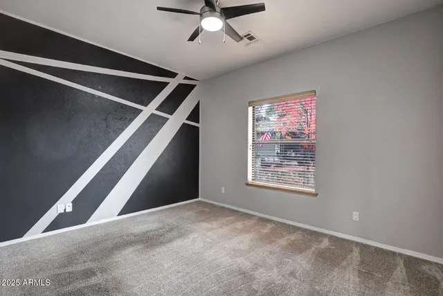 a view of a hallway with staircase