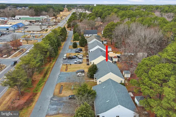 an aerial view of residential house with outdoor space