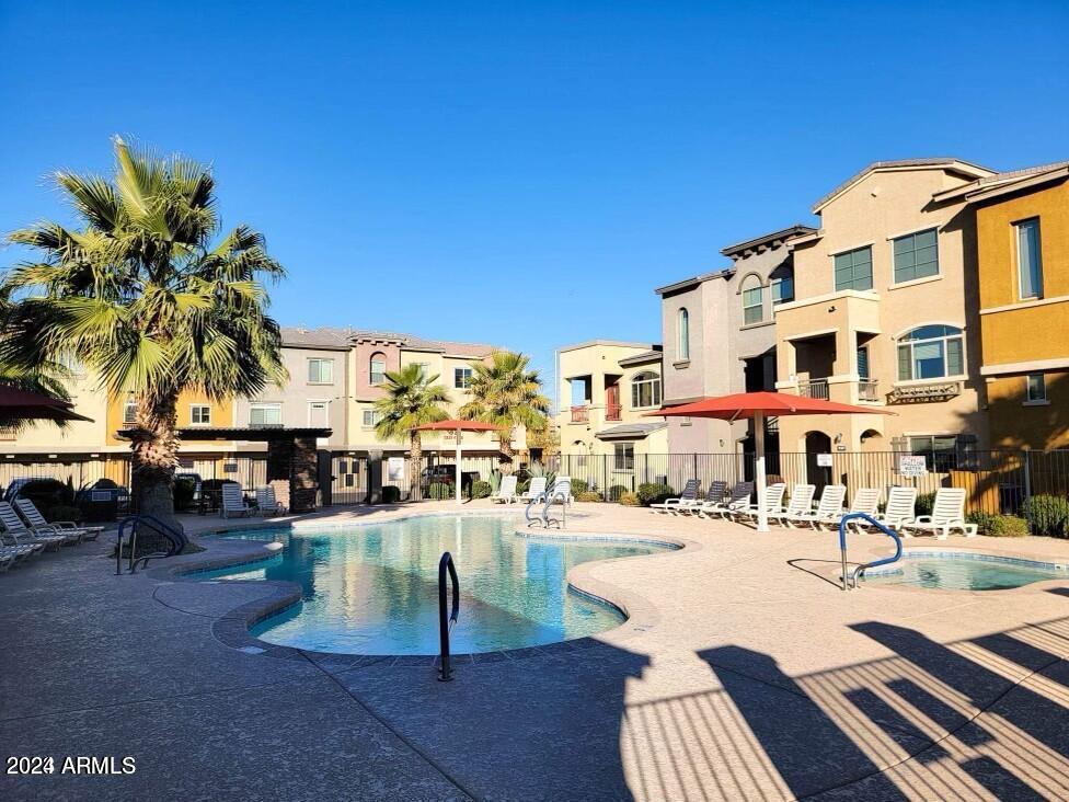 2150 West Alameda Road, Unit 1169 Phoenix, AZ 85085 - Photo 3 of 26 a view of a patio with swimming pool