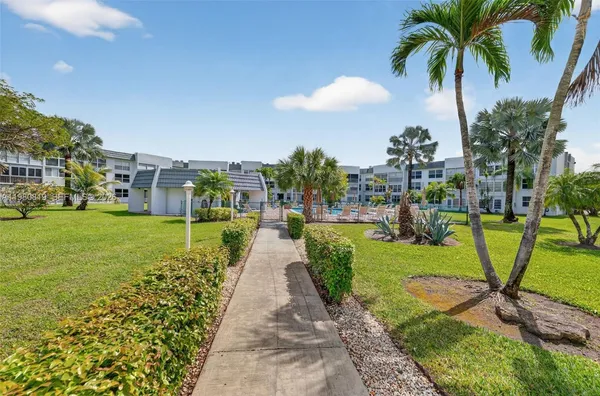 a view of a house with swimming pool
