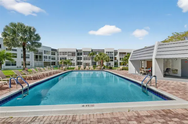 a view of a playground with a patio